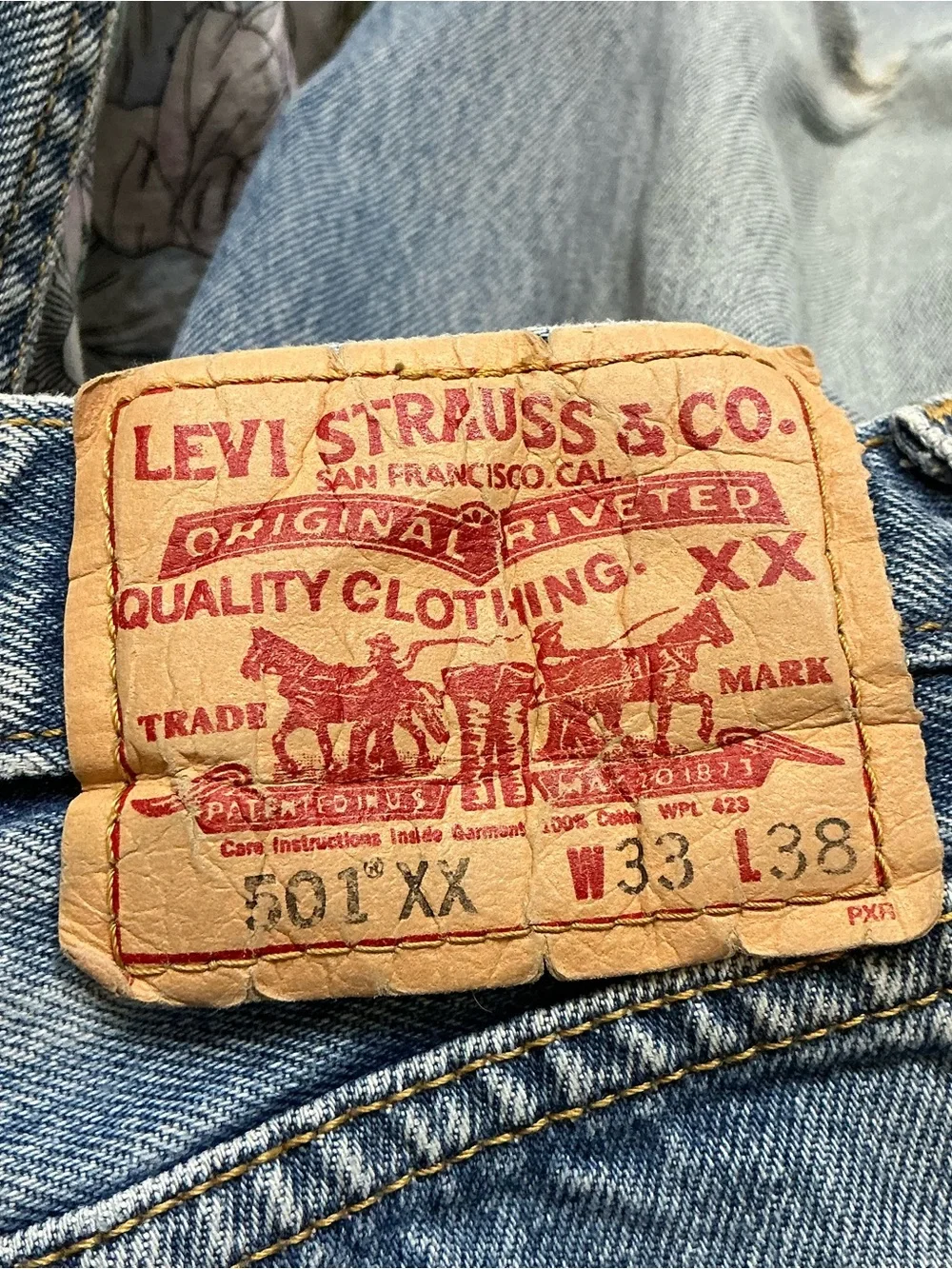 Vintage Levi’s 501XX button fly medium wash straight leg jeans 32 x 32
